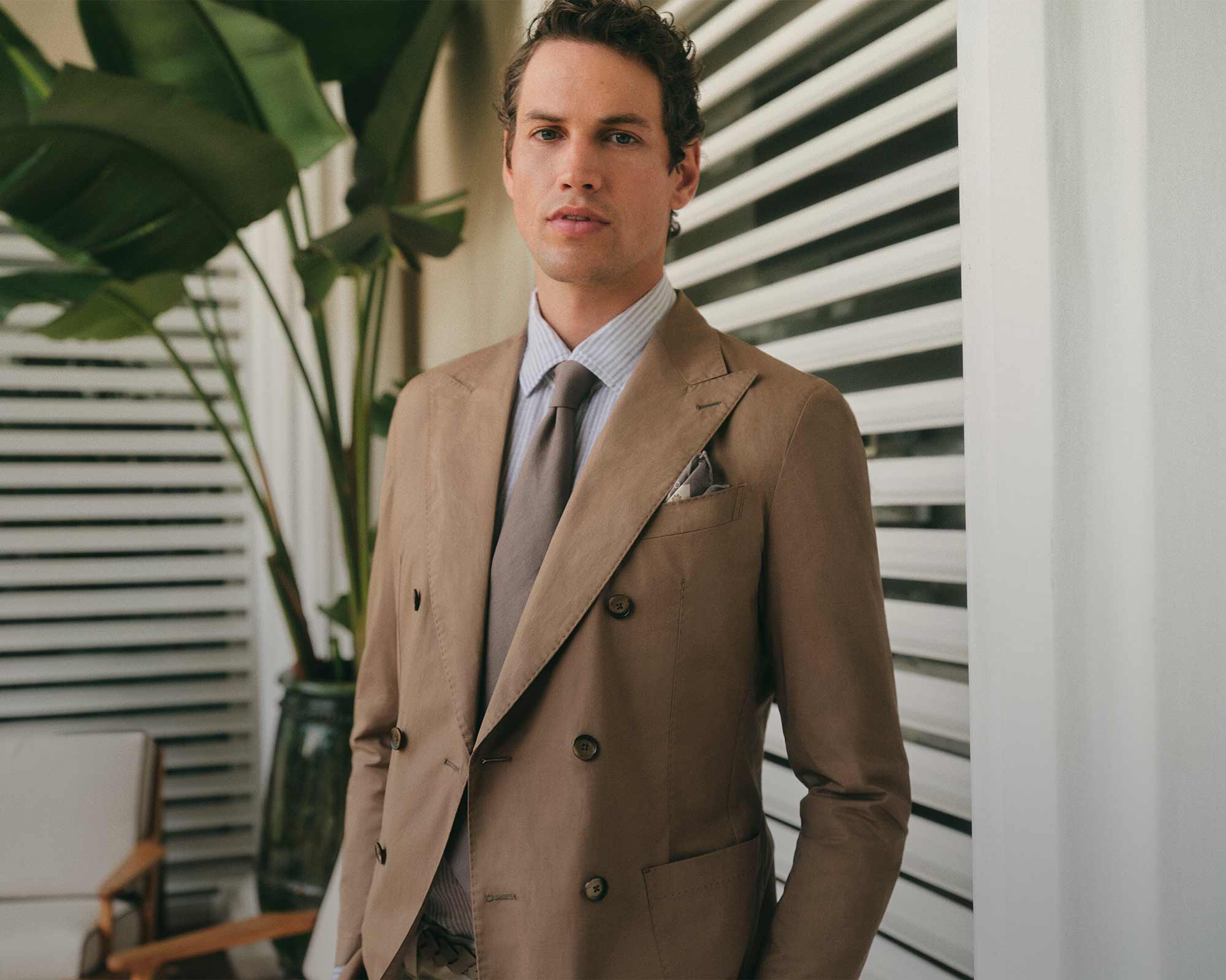 windsor men double-breasted jacket in brown with buttons in brown tie in brown and shirt blue and white striped