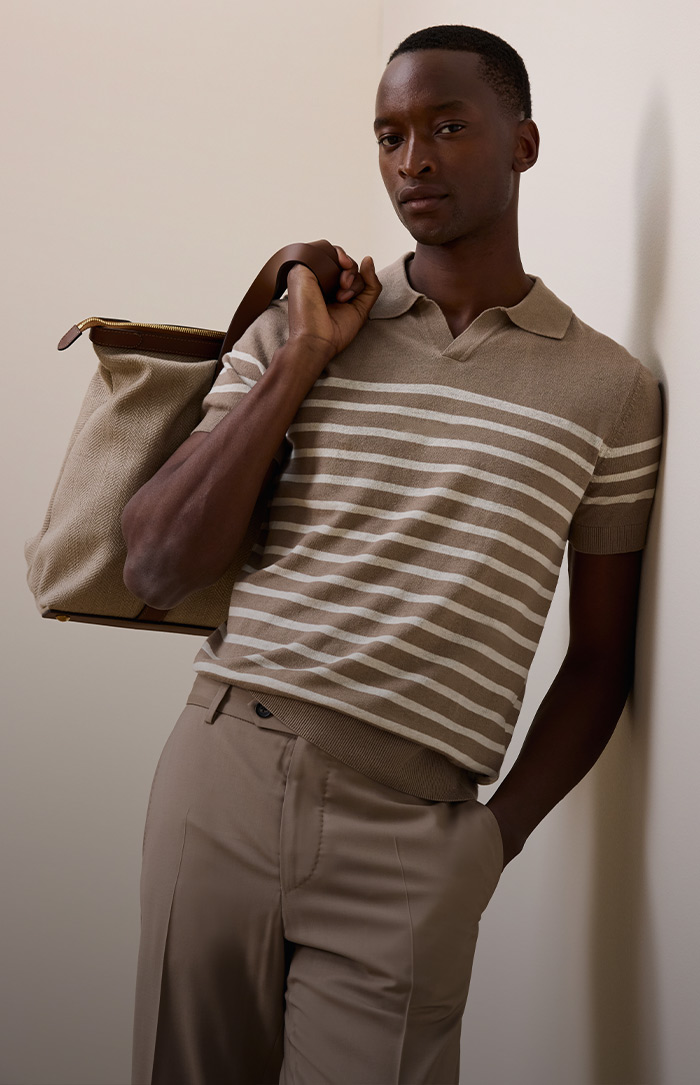 windsor men knitwear in brown with stripes in white, trousers in brown and bag in beige