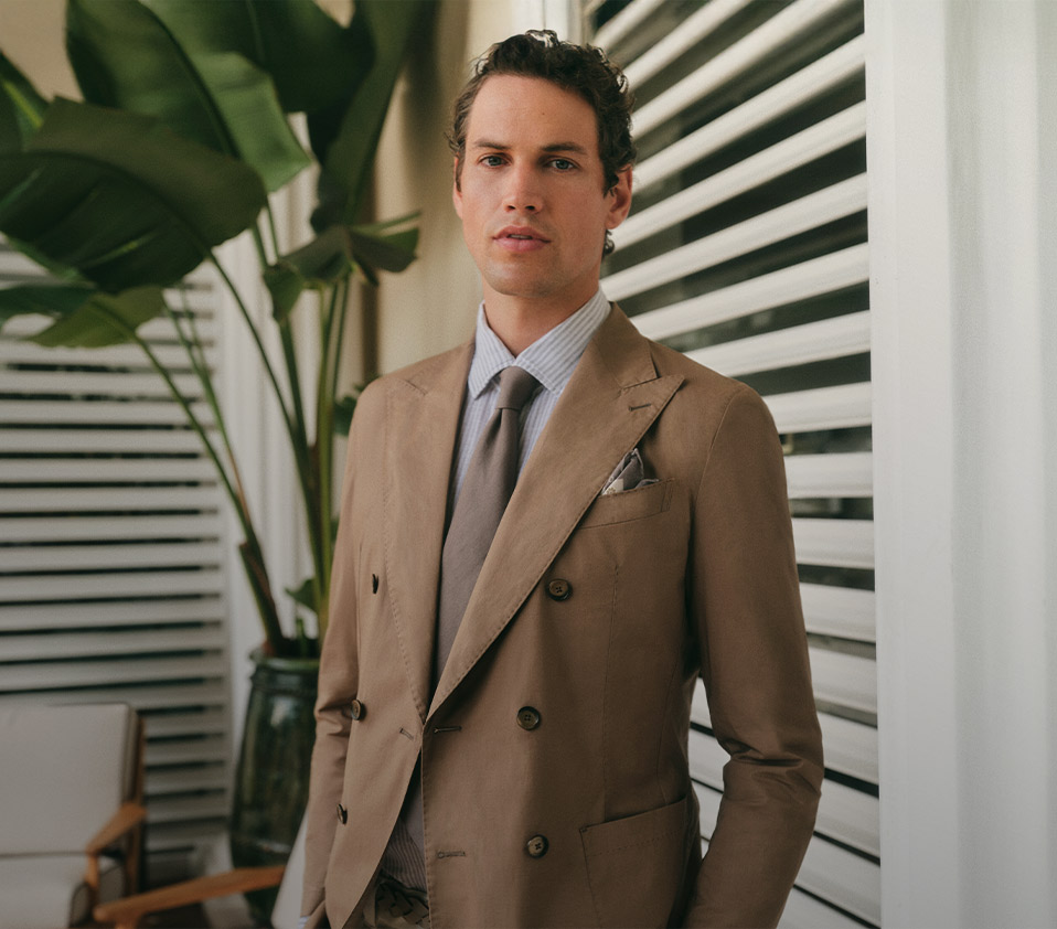 windsor men double-breasted jacket in brown with buttons in brown tie in brown and shirt blue and white striped