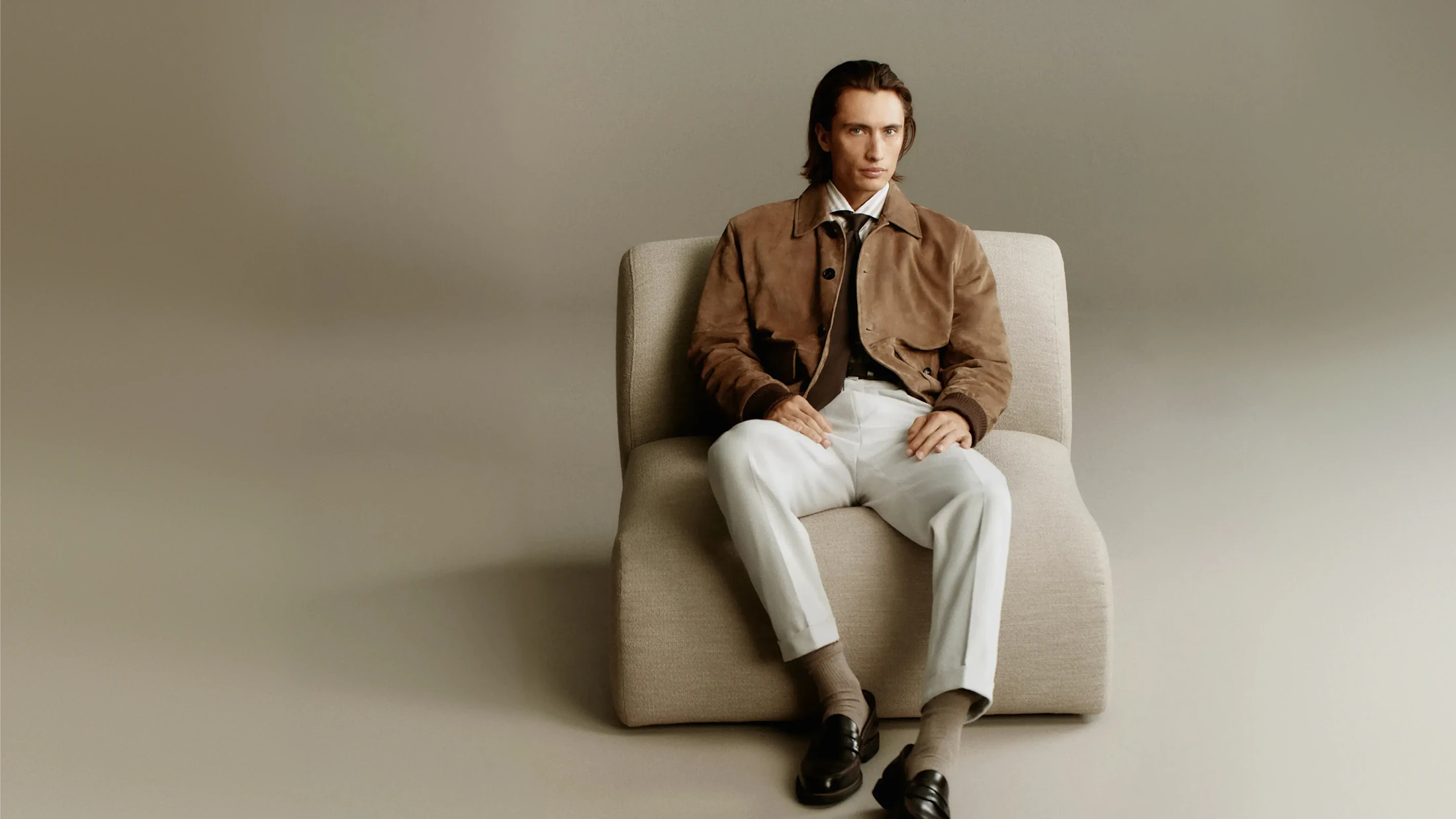 Windsor men leather jacket in brown with white trousers and striped shirt