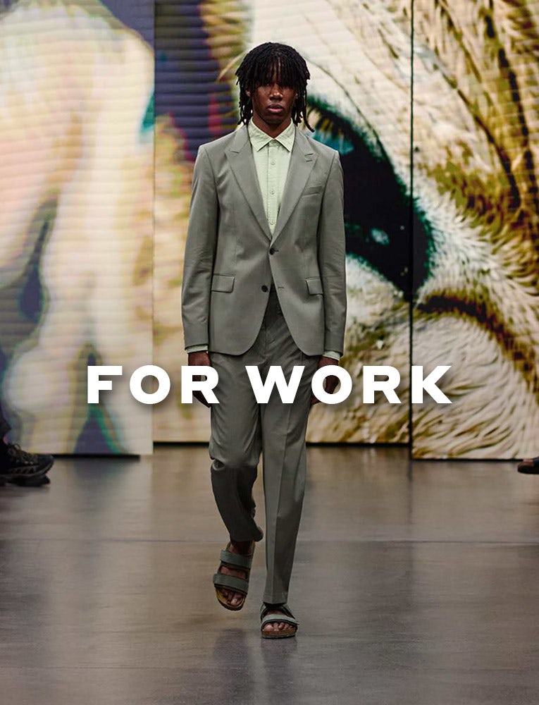 What to wear – for work, Mann mit grünem Anzug