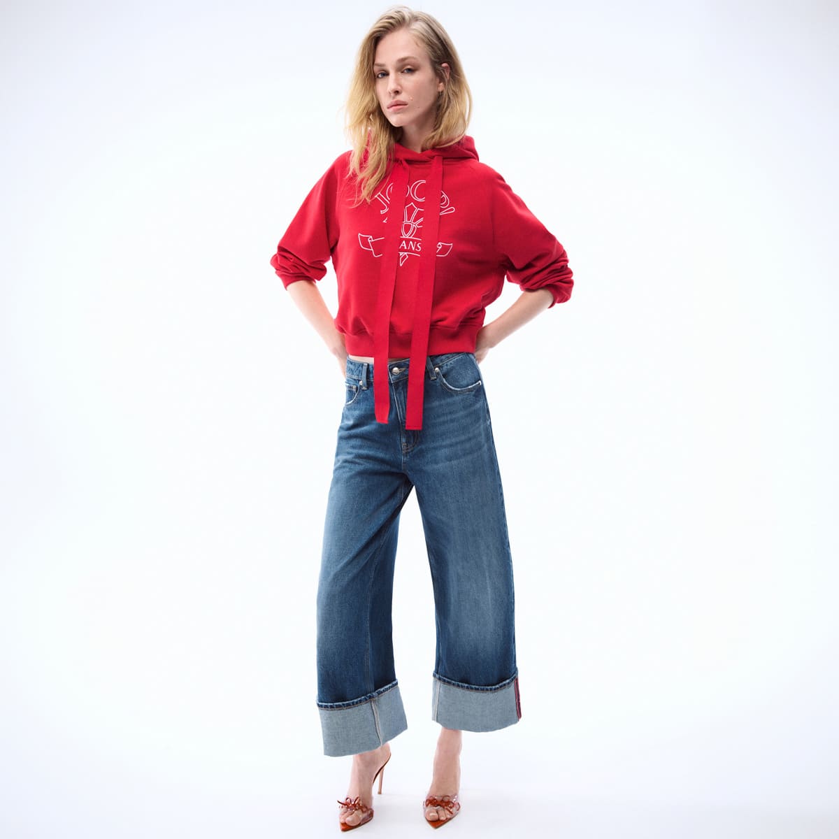 joop jeans women woman with red hoodie and dark blue jeans pants