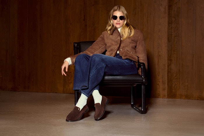 JOOP! Woman wearing aviator-style sunglasses