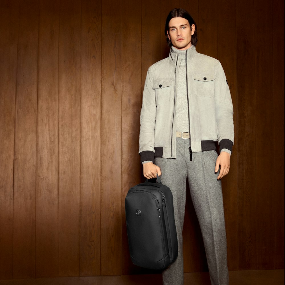 JOOP! Man in beige suede blouson with backpack