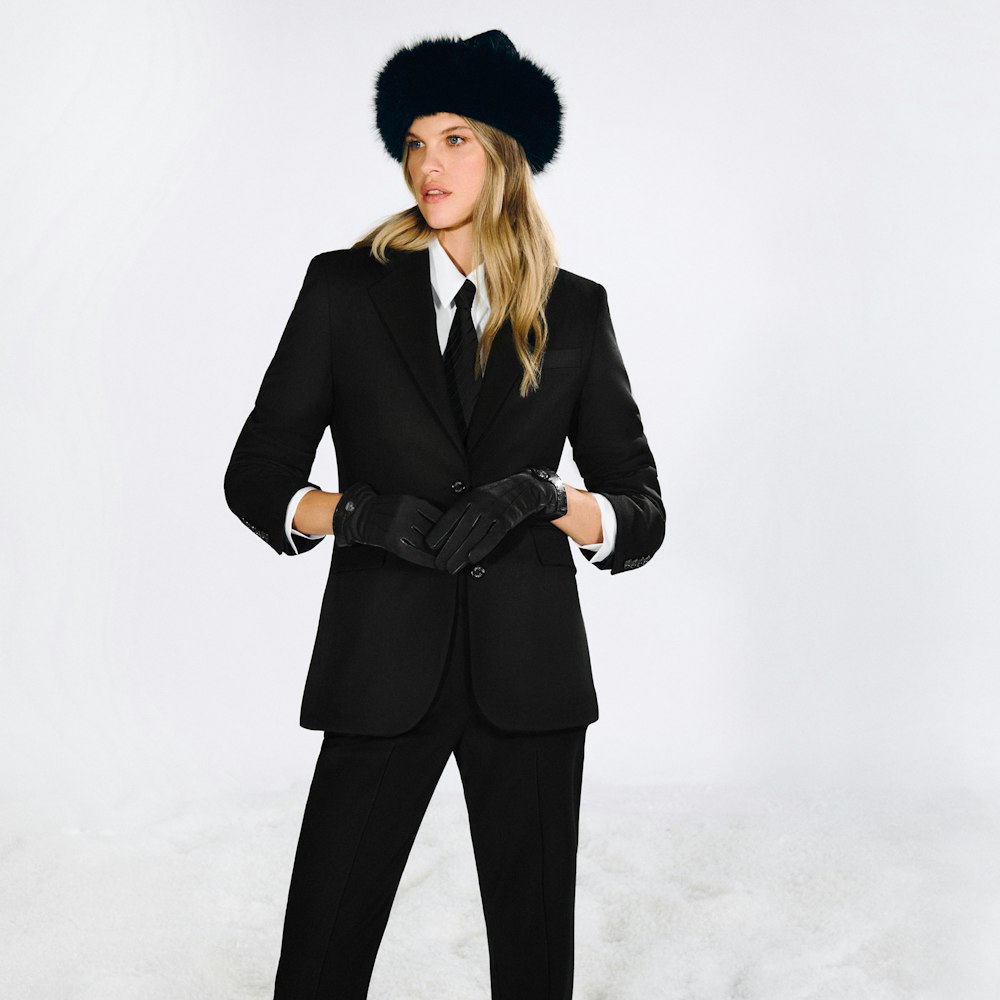 JOOP! Woman in black suit with fur hat