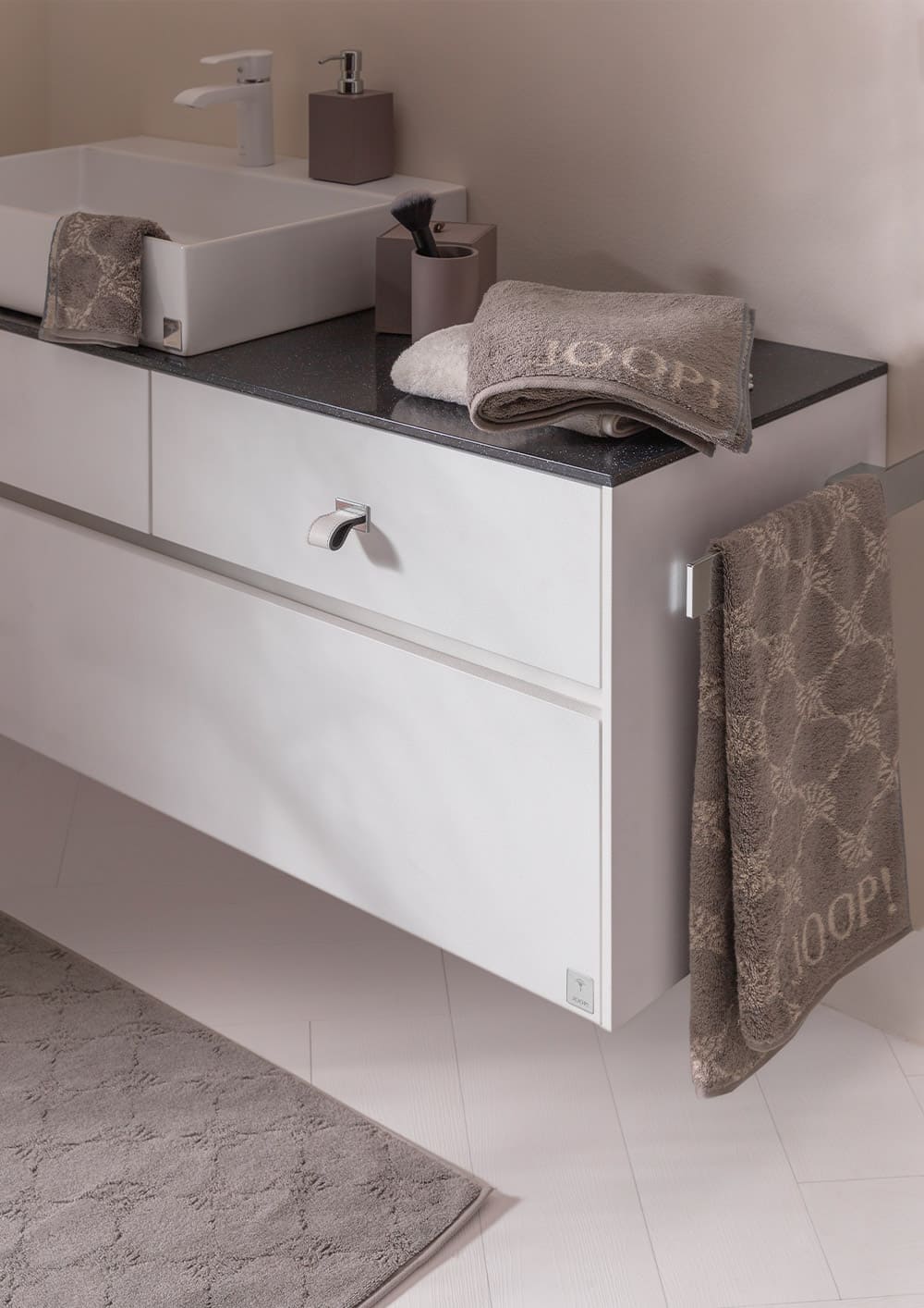 joop living towels with a cornflower pattern in taupe