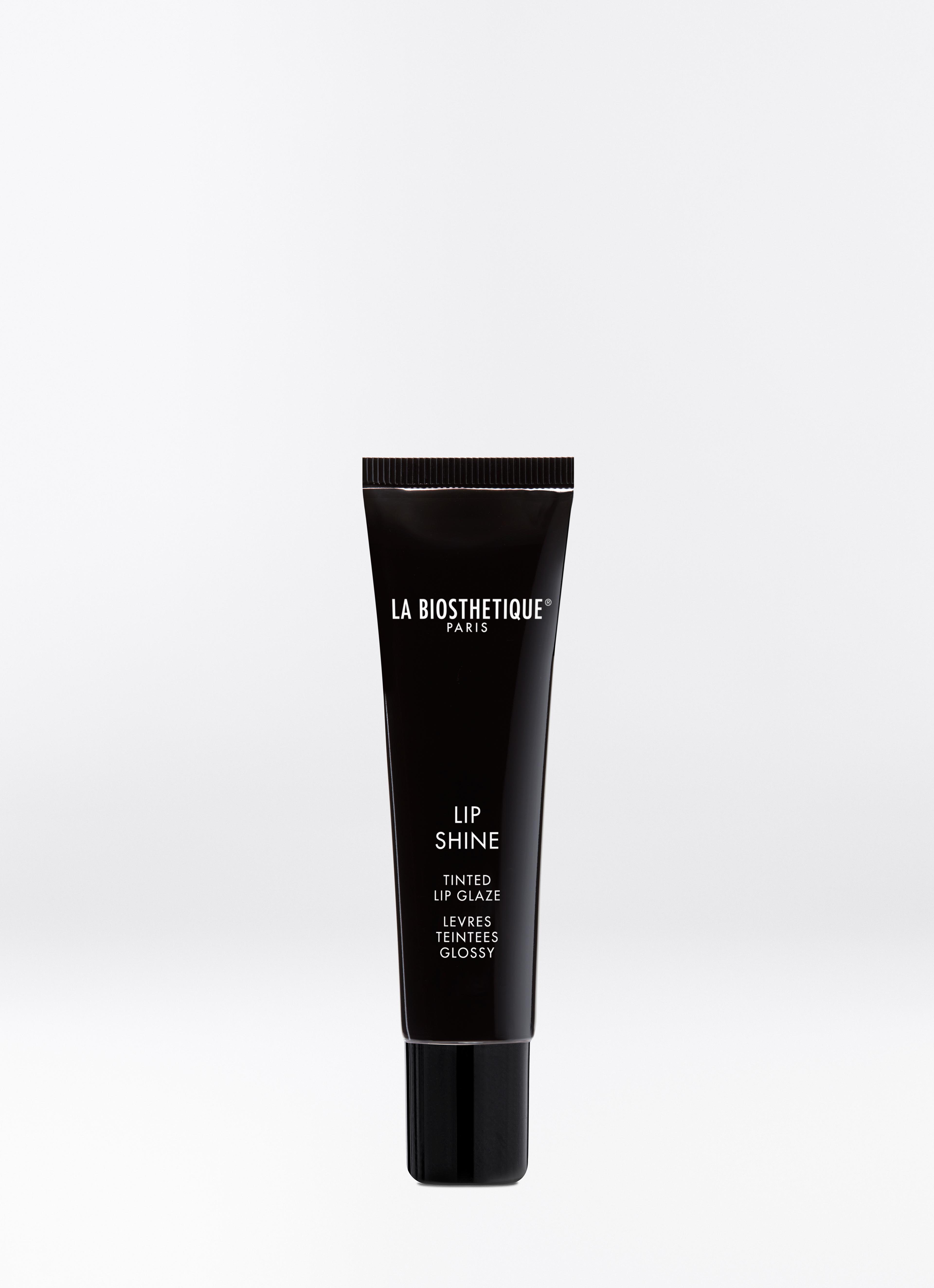 Schwarze, matte Kunststofftube des Lip Shines